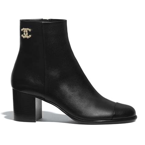 chanel black boots saks|Chanel black canvas heel boots.